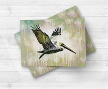 Load image into Gallery viewer, Pelican Flying Wall Art Print, Decor for Beach House, Water Inspired Print, Ocean Life Art Print, Water Bird Art
